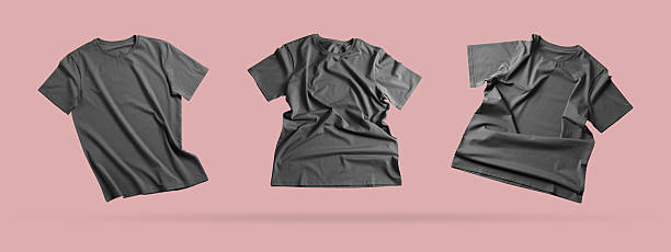 Grey t-shirt in air on pink background