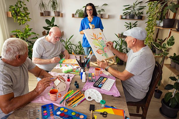 istock Seniors enjoying art therapy 2238370416