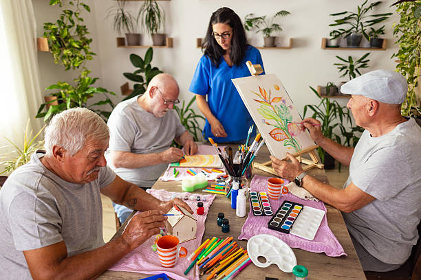 istock Seniors enjoying art therapy 2238370417