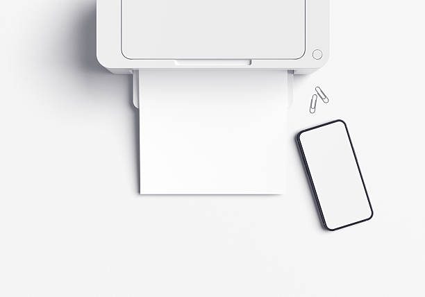 istock Blank A4 paper coming out of printer, Smart phone, Printer mockup, Empty A4 mockup. Perfect for project presentations. 2238370722