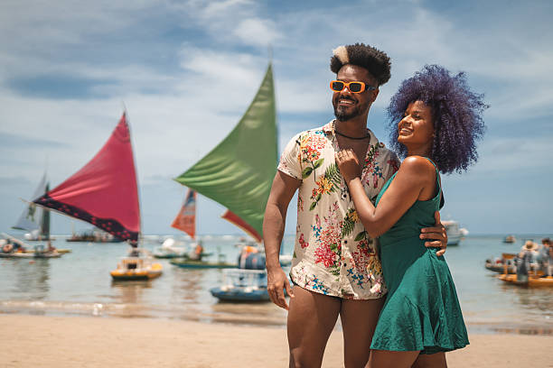 istock Afro couple enjoying summer on Porto de Galinhas beach 2238372146