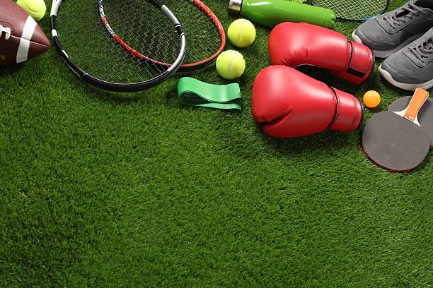 istock Different sport equipment on artificial grass, above view. Space for text 2238372226