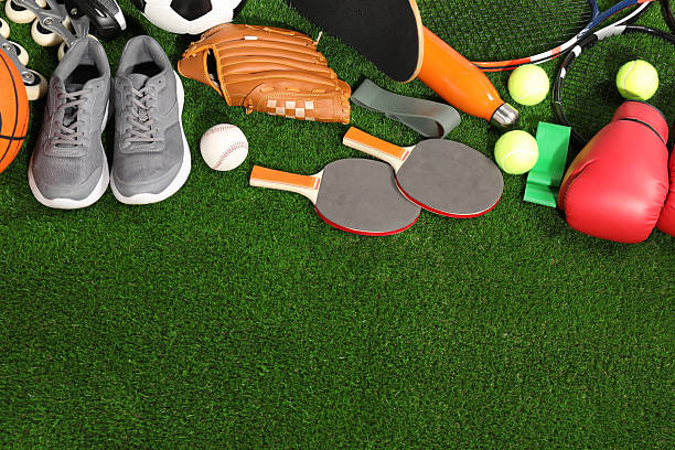 istock Different sport equipment on artificial grass, above view. Space for text 2238372543