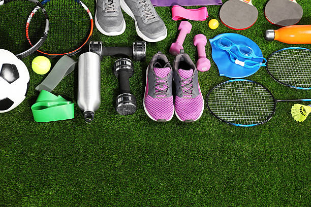 istock Different sport equipment on artificial grass, flat lay. Space for text 2238372567