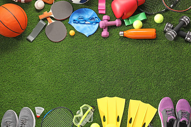 istock Different sport equipment on artificial grass, flat lay. Space for text 2238372595