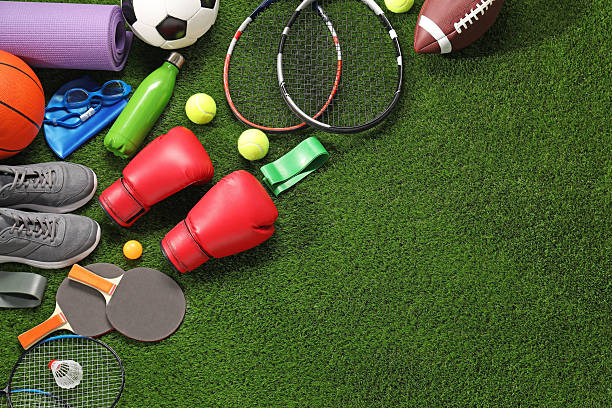 istock Different sport equipment on artificial grass, flat lay. Space for text 2238372831