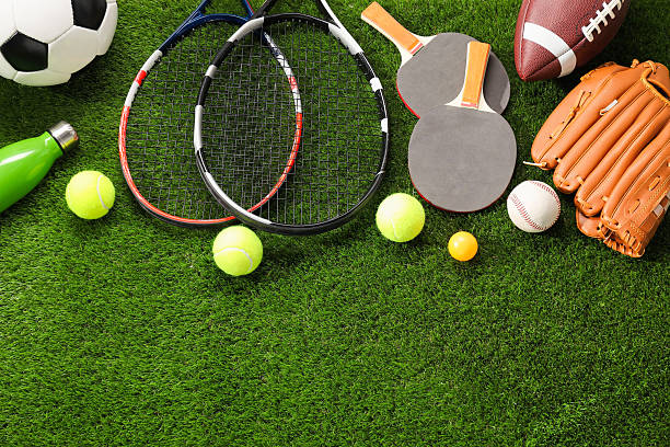 istock Different sport equipment on artificial grass, flat lay. Space for text 2238372904