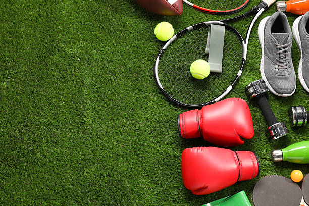 istock Different sport equipment on artificial grass, flat lay. Space for text 2238372912