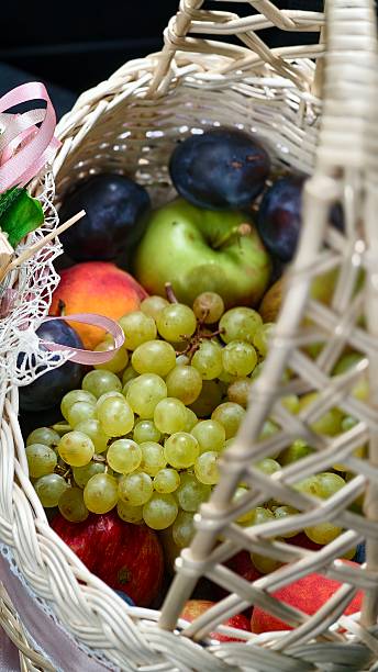 istock White Basket with Assorted Fresh Fruits 2238377411
