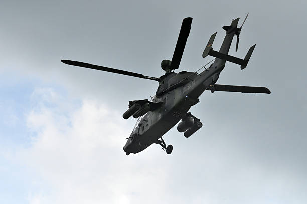 Lithuania, Vilnius, May 22, 2025: military twin-engined attack helicopter Tiger, from Airbus Helicopters flies at airport  in Vilnius, Lithuania