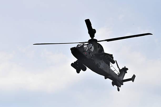 Lithuania, Vilnius, May 22, 2025: military twin-engined attack helicopter Tiger, from Airbus Helicopters flies at airport  in Vilnius, Lithuania