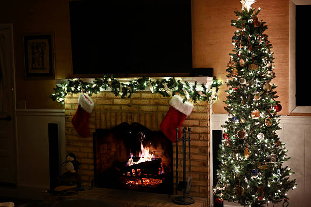 istock Christmas Tree by Fireplace with Stockings 2238378775