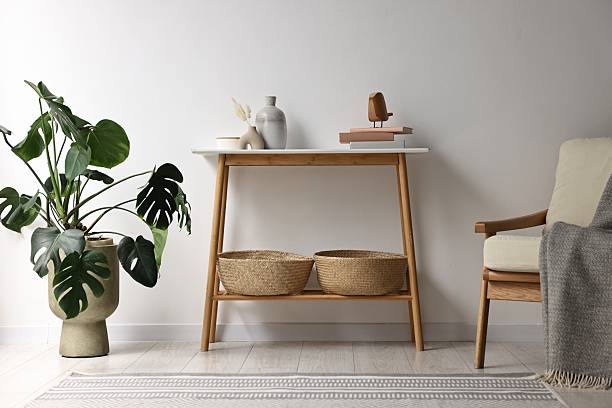 istock Stylish room interior with console table near white wall 2238379622