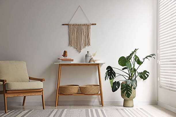 istock Stylish room interior with console table near white wall 2238379673