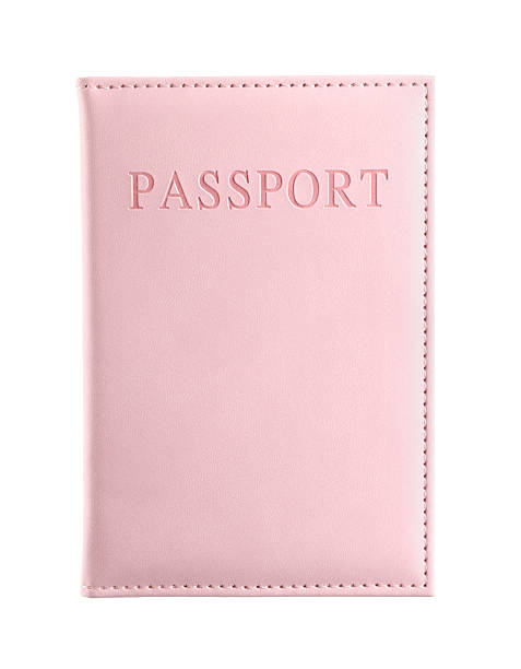 istock Passport in pink cover isolated on white 2238379787
