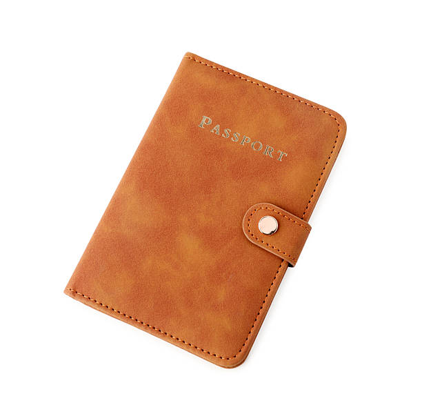 istock Passport in brown cover isolated on white, top view 2238379828
