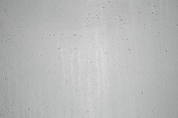 istock Water drops on grey glass surface, top view 2238380419