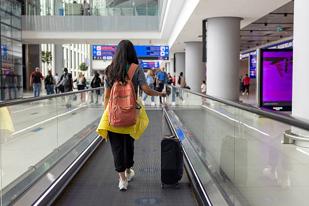 istock woman at the airport 2238381079