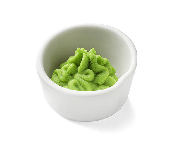 istock Hot wasabi paste in bowl isolated on white 2238389337