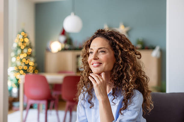 istock Beautiful middle aged woman at home 2238389743