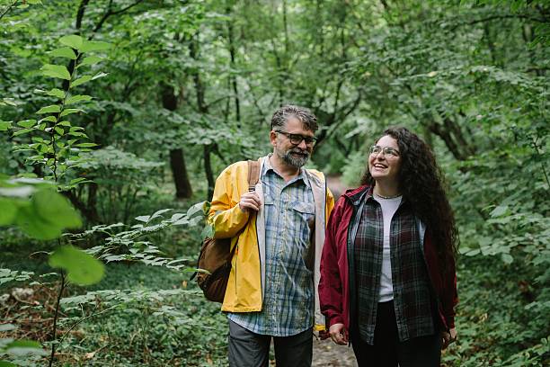 istock Father and daughter hiking happy in forest 2238390591