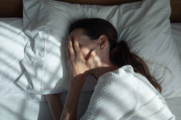 istock Woman suffering from insomnia. 2238390680