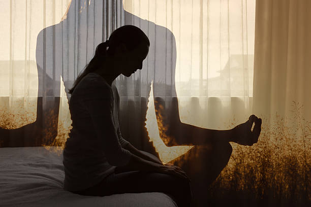 istock Woman doing mental meditation for stress management. 2238390866