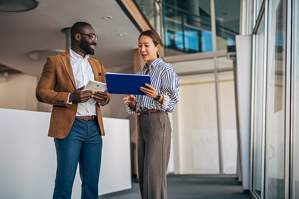 istock Diverse business colleagues discussing market strategy plan in office 2238394692