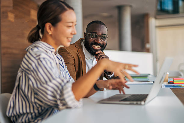 istock Diverse business people discussing ideas in office meeting 2238395309