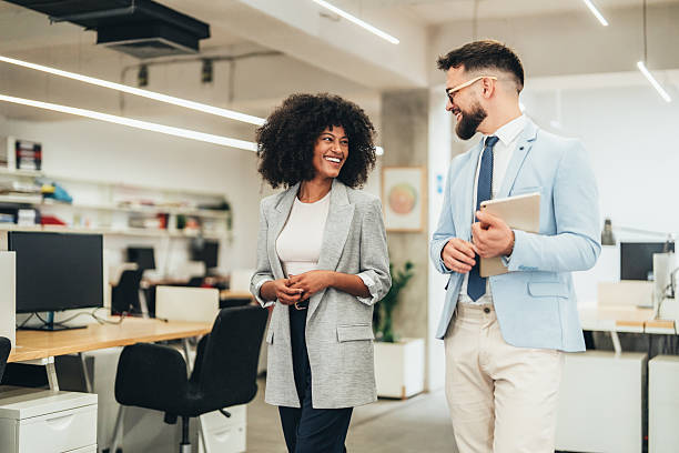 istock Business colleagues talking in the office 2238399220