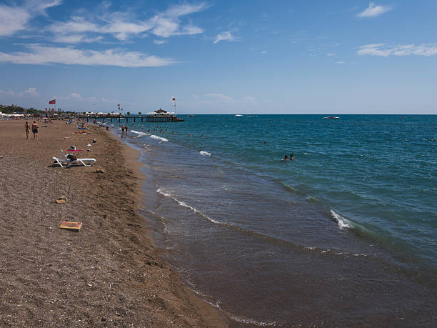 Antalya, Turkey - 09/09/2025: People enjoying vacation on Mediterranean beach