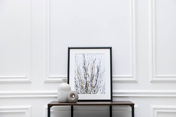 istock Console table with decor near white wall in room. Interior design 2238403144