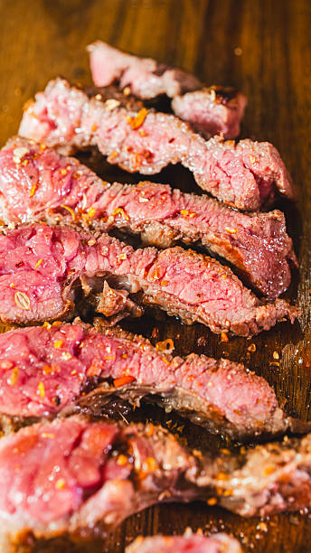 istock Juicy Medium Rare Sliced Steak Close Up 2238409775