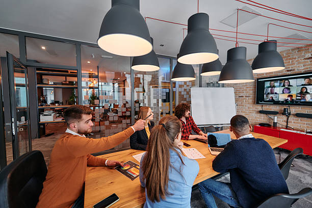 istock A diverse team of business professionals engage in discussions on various projects and develop new business strategies, epitomizing creativity and innovation in the entrepreneurial landscape 2238411327
