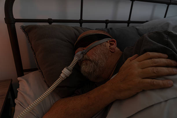 istock Nighttime breathing support. Medical device assists patient. 2238422210