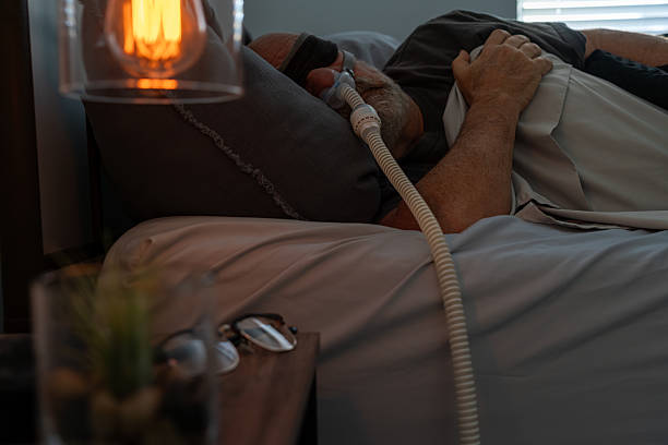 istock CPAP therapy at night. Respiratory support during sleep. 2238422221