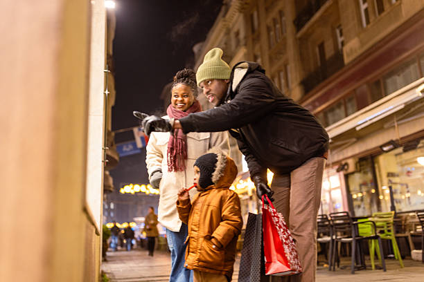 istock Family Enjoying Evening City Walk 2238426309