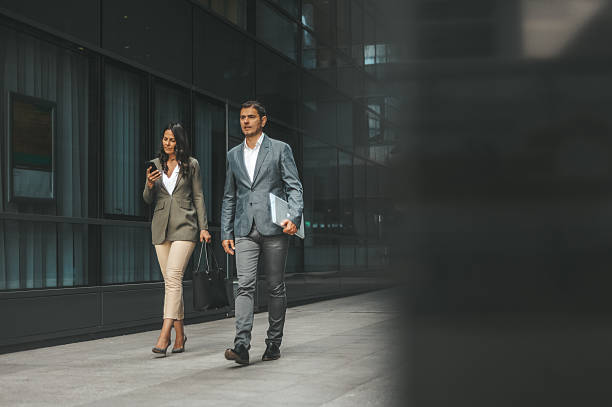 istock Formal Business Professionals Walking Outdoors 2238428724