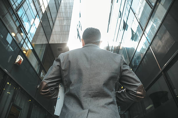 istock Businessman in Modern Glass Building 2238428767