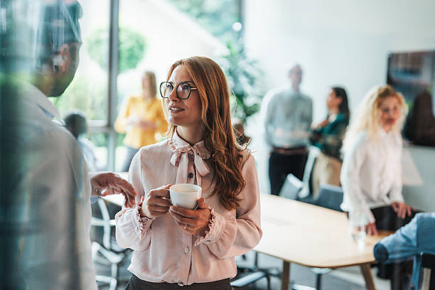istock Business colleagues talking in the office 2238436234
