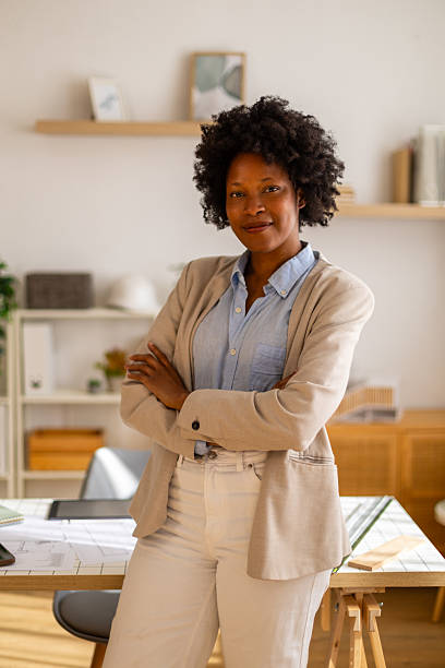 istock Confident black architect standing with arms crossed in office 2238436507