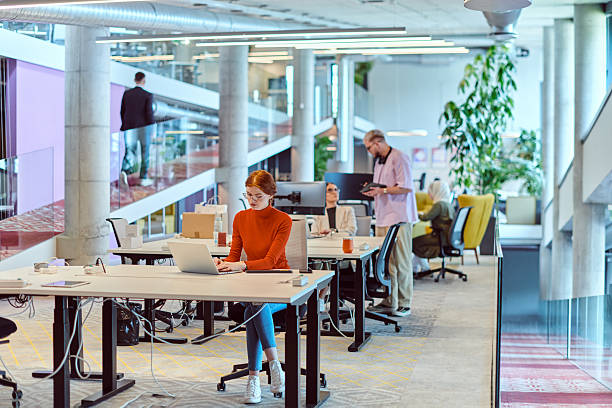istock In a modern startup office, a diverse group of young professionals collaboratively tackles various business problems and challenges, surrounded by their engaged colleagues, fostering innovation and productivity 2238442359