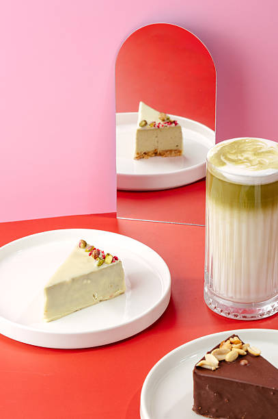 istock cheesecakes and coffee on a pink background 2238443890