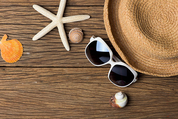 istock Starfish and Sea Shell  On White Sand Beach with Ocean Wave Splashing 2238449190