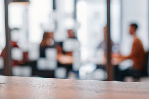istock Strategic Conversations: Business Professionals Collaborate in a Modern Office Setting. 2238453115