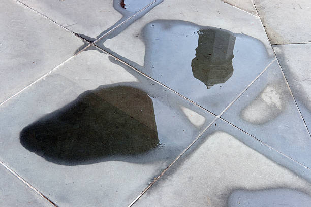 istock reflect on water and wet floor 2238455302