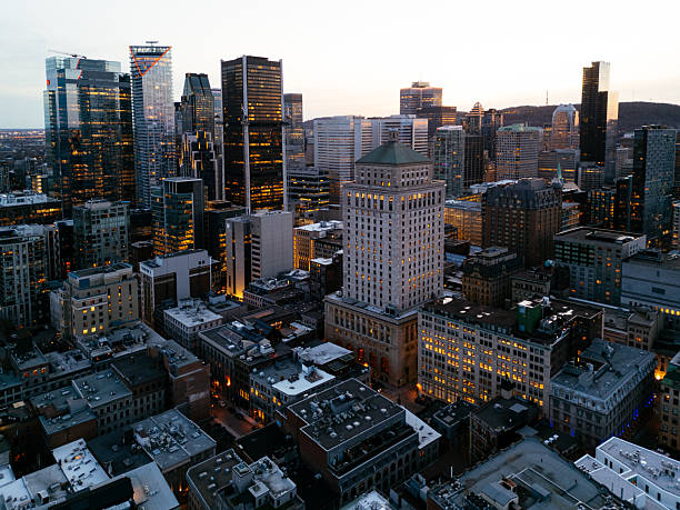 istock Montreal evening skyline with illuminated streets in Old Port district. g 2238456659