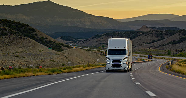 istock White Semi-truck Driving Uphill on I-70 in Utah 2238458317