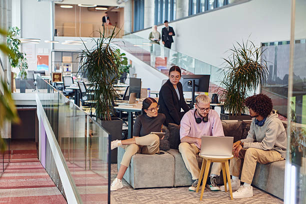 istock In a modern startup office, a diverse group of young professionals collaboratively tackles various business problems and challenges, surrounded by their engaged colleagues, fostering innovation and productivity 2238460865