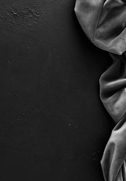 istock Black background template drapery velvet texture frame top view on black textured  backdrop. 2238464581